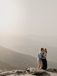 couple about to kiss at sunset