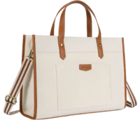 A cream tote bag with a brown leather strap.