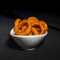 onion rings with sauce Max Dales Steak and Chop House Restaurant