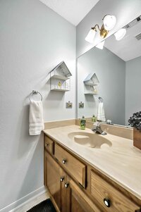 Bathroom vanity at this 3-bedroom, 2.5 bathroom rural vacation rental house just minutes outside of downtown Waco, TX.
