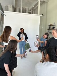 Kemotion business owner getting professional photos taken, expert in custom website design for service-based businesses.