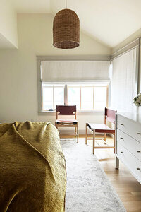 Boston interior designer creates a simple, comfortable New England beach house steps from the ocean, blending relaxed coastal living with modern design.