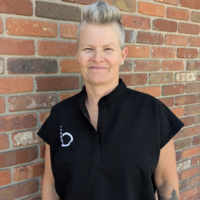 Sara, a trusted massage therapist at Bodyology, specializing in personalized healing treatments
