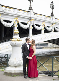 Young couple embraces during anniversary photography session in Paris