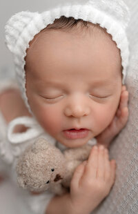 Syracuse photographer, newborn, baby, props, newborn photoshoot, photography, belly, backdrop, studio, white