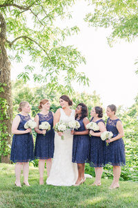 Bridesmaids in navy dresses