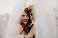 Bride and groom veil photos