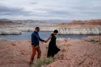 A romantic engagement proposal at the Antelope Canyon Overlook, with stunning views of Lake Powell and the surrounding desert landscape.