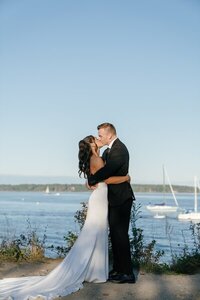 Bride and groom kissing on their wedding day taken by east coast photographer