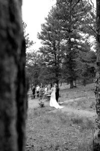 ceremony view of bride and groom in colorado