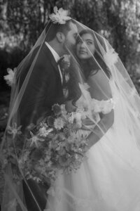 Bride with long, soft waves — natural and romantic bridal hair styled by Klover Beauty for an elegant Maryland wedding.