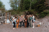 A group of photographers standing together and smiling 