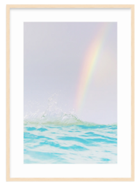 Vertical framed image of rainbow over the ocean at sunrise on Maui by Love + Water