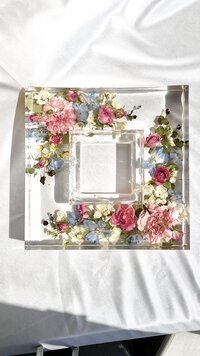 funeral flowers preserved in resin in the shape of a soap dish