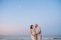 Couple gets photos taken on Indian Rocks Beach by St. Pete Photographer