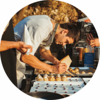 Chef Matteo cooking outside