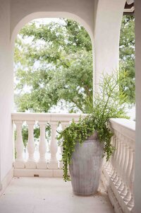 outdoor space with pot and greenery