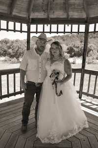 bride and groom gazebo wedding portrait