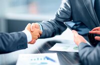 Expert financial advisors in Dallas working at their financial office. The image showcases their professional environment, reflecting their expertise and commitment to providing top-notch financial advice.