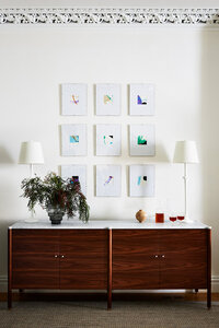 Brownstone interior designer updated a South End brownstone with original plaster molding and modern furniture, blending old and new. Featured by Rue Magazine.