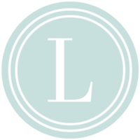 leslie ann photography circle logo