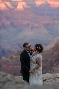 Close-up of a couple during their elopement, with the Grand Canyon’s stunning natural beauty behind them