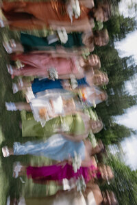 Abstract photo of a bridal party walking together at a wedding in downtown Nashville. 
