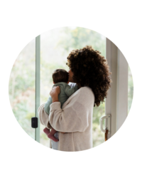 happy mom holding her baby.