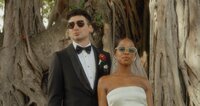 bride and groom wearing sunglasses