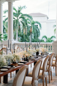 Elegant wedding reception table decor at coastal wedding.