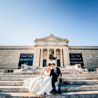 bride and groom on the steps of the cleveland art museum