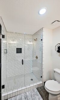 Walk in shower in this modern vacation rental condo in downtown Waco, TX