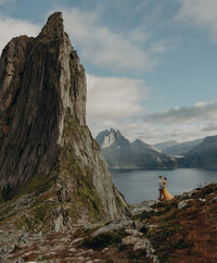 a couple embracing on a mountain t