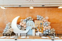 wedding table with florals, oak table with black chiavari chairs