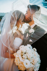 creative pittsburgh wedding photo with veil