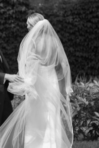 detail of bride in alexandra grecco gown in black and white vermont wedding