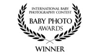logo from the International Baby PHotography contest Baby Photo Awards Winner badge