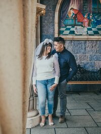 A wedding videographer and his fiancée capturing engagement moments at Disneyland.