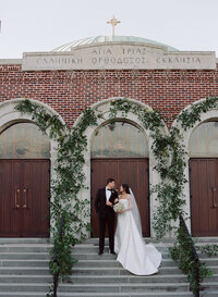 Bride and groom walk up memorial steps at their DC wedding