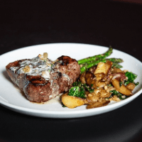 the manhatten with garlic thyme butter Stanwood Grill Restaurant