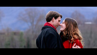 A couple standing close about to kiss 