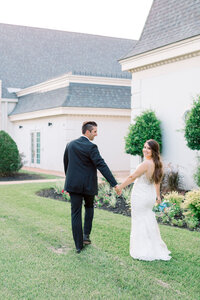 Bride and groom walk up memorial steps at their DC wedding