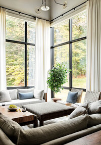 Arch Digest Interior Designer in Boston showcases a modern living room in Vermont with curated furnishings and clean lines for a stylish, welcoming retreat.