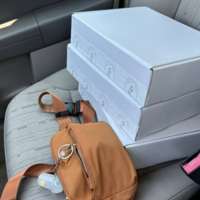 A carefully curated thank you box filled with personalized items, including a custom USB, handwritten note, and business cards, representing a heartfelt gesture of appreciation for my wedding photography clients.