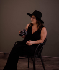 woman sitting and smiling