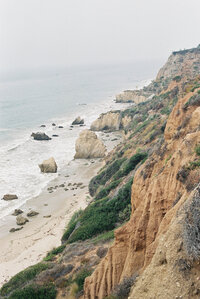 Coastal cliffs and sea tones representing natural environments often featured in Seattle wedding photography.