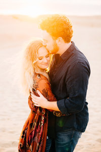 Boho beach engagement photography at Pismo Beach dunes by Amber McGaughey