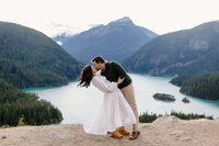 couple dip kissing at diablo lake