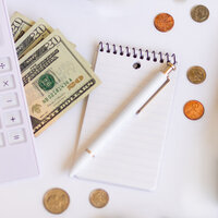 Note pad, pen, and money