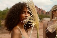 Image of woman modeling with plant from Brand photographer nyc at ADP Studio